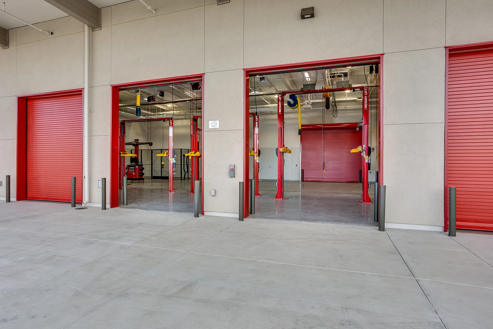 Double Open Garage Bays looking into Automotive Repair Shop