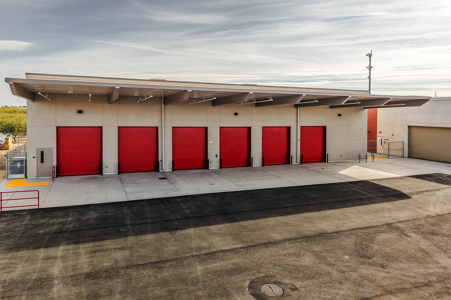 High-Angle View of Commercial Maintenance Garages and Canopy