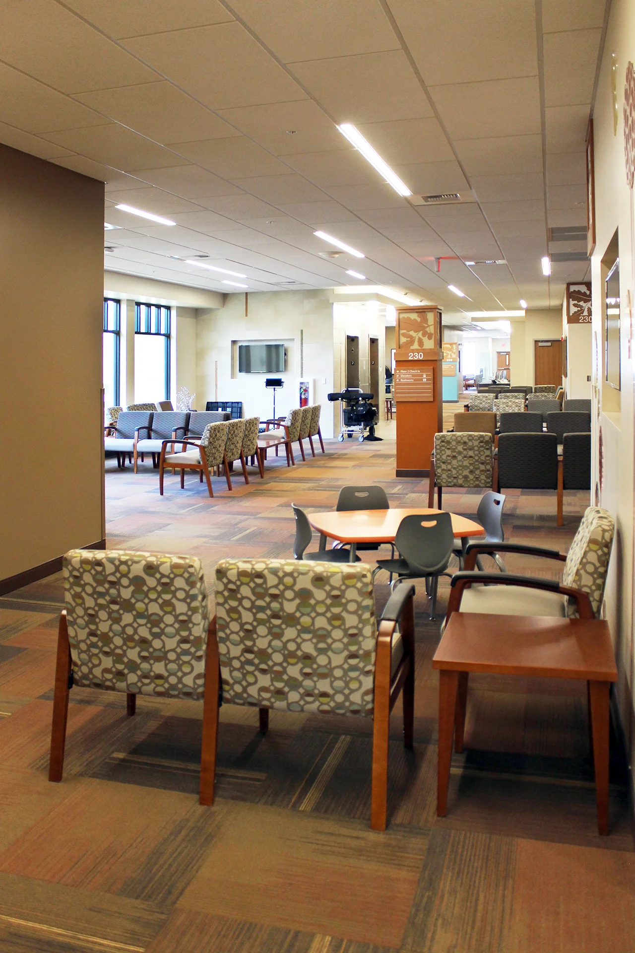 Patient waiting area inside the Sutter Gould Tracy Medical Office Building featuring comfortable seating, accessible gathering spaces, clear wayfinding signage, and a bright, welcoming healthcare environment.